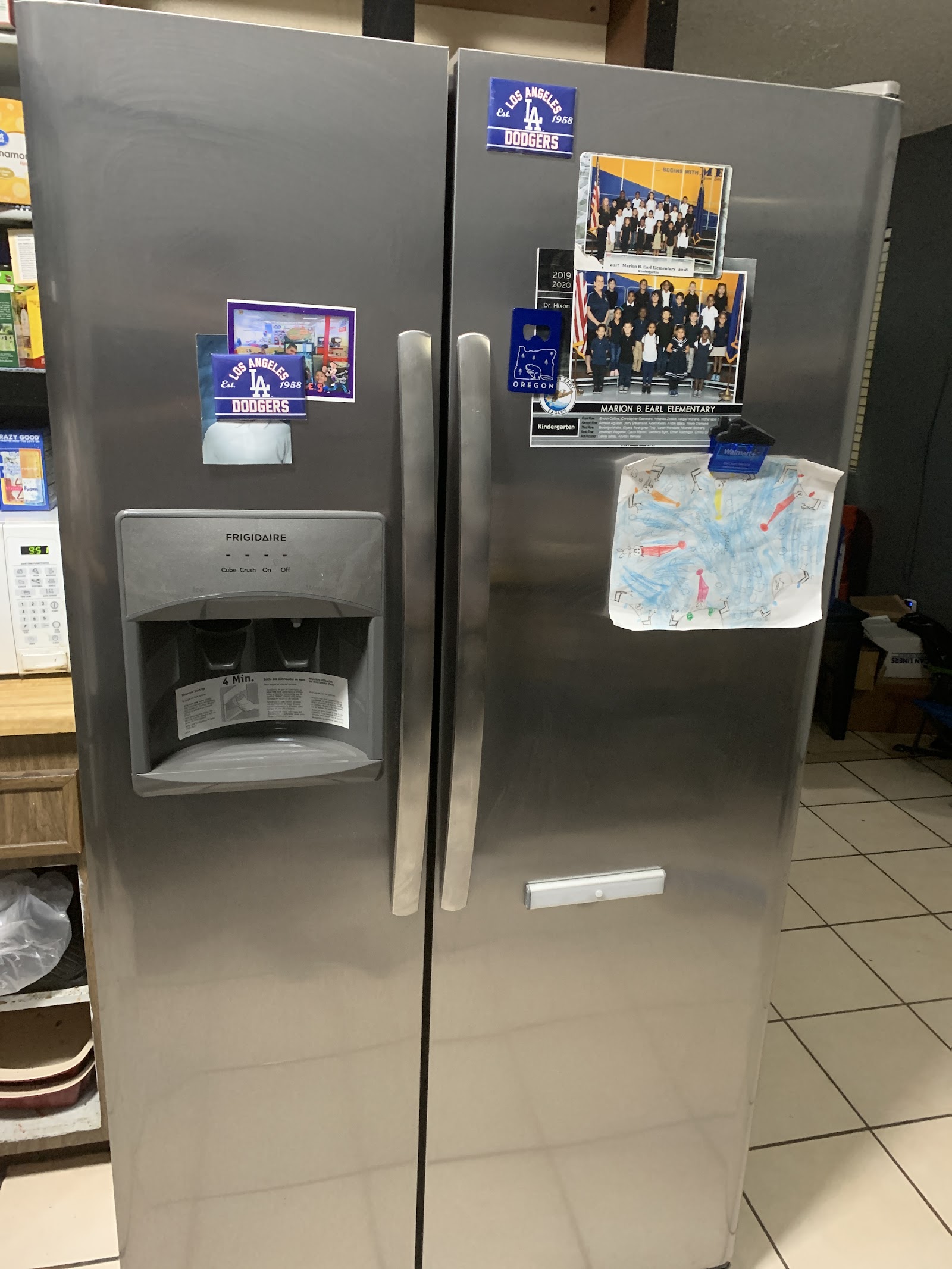Stainless steel Frigidaire side-by-side refrigerator in a kitchen